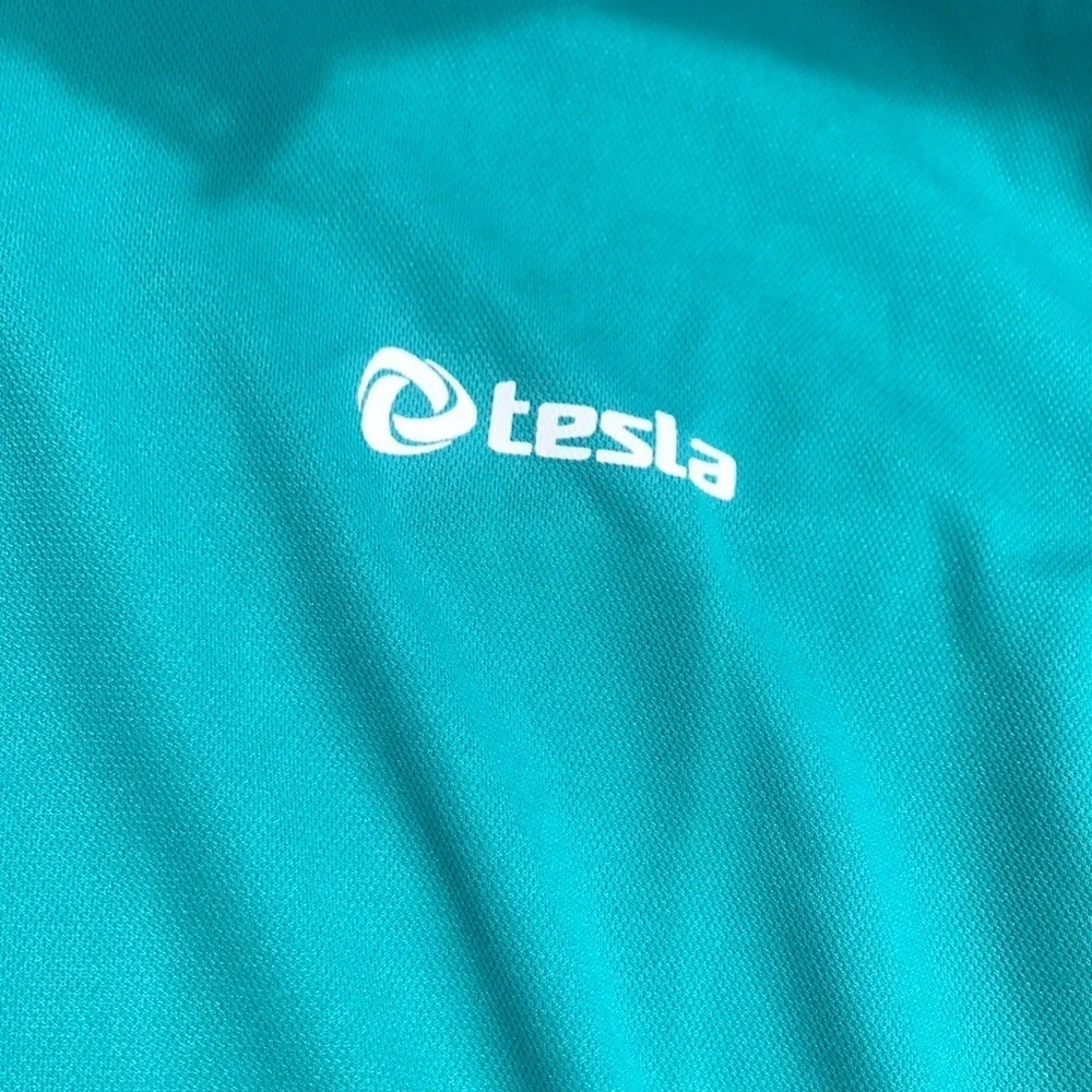 NWOT Tesla swim top Medium